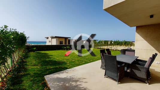 4 Bedroom Villa for Sale in North Coast, Matruh - Furnished Sea View Stand Alone For Sale in Swan Lake North Coast .