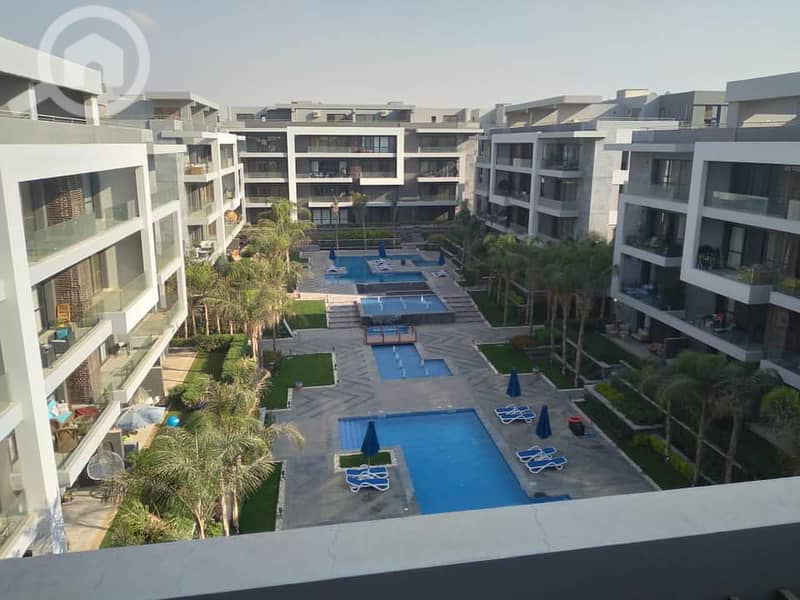 Apartment Delivery Now in El Patio Oro Lavista in Fifth Settlement In golden square A very distinctive view of the landscape and water bodies