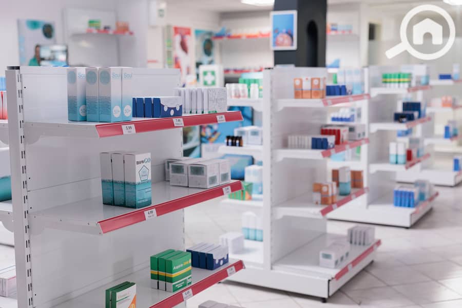 2 empty-drugstore-with-bottles-packages-full-with-medicaments-retail-shop-shelves-with-pharmaceutical-products-pharmacy-space-filled-with-medical-drugs-pills-vitamins-boxes. jpg